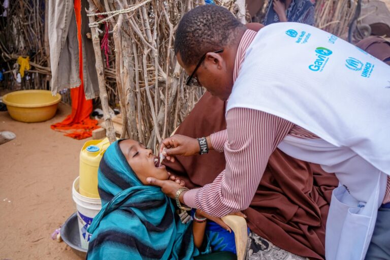 young african girl getting immunized